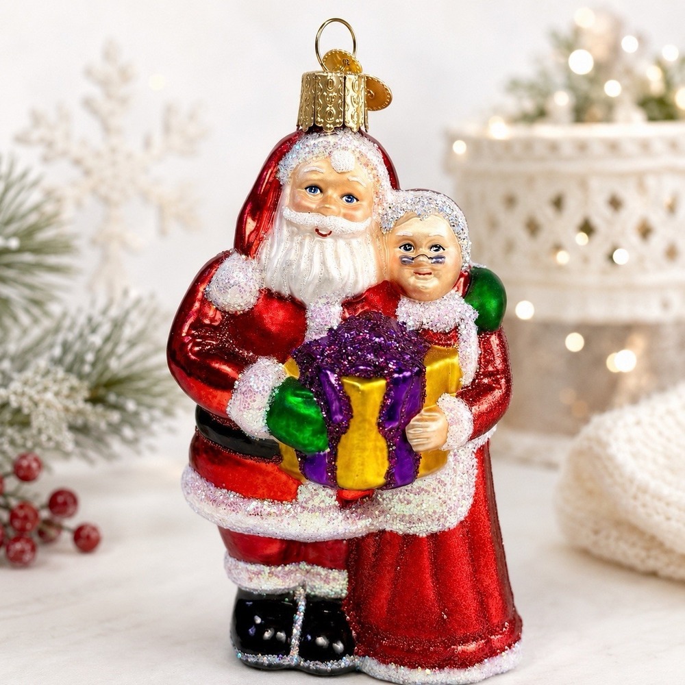 Old World Christmas Santa Mrs Claus Glass Ornament Holding Gift Retire 4.25"